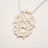 ANTIQUE LACE INITIAL LONG NECK